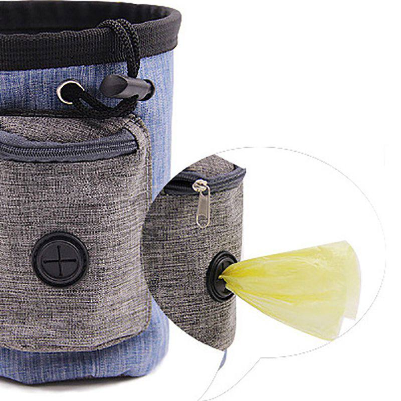 Portable dog snack bag clipped to leash during trail hike