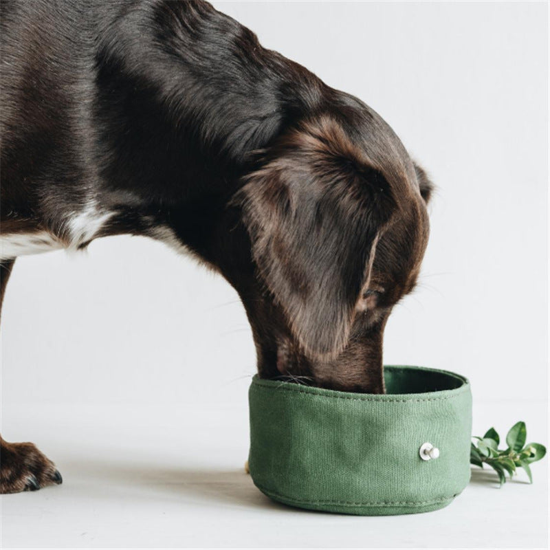 Dog travel bowl unfolded showing round shape and oil wax canvas material