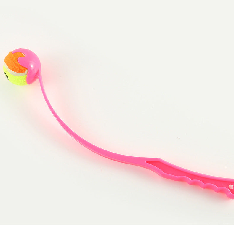 Pink dog fetch launcher toy for outdoor training and play