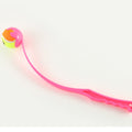 Pink dog fetch launcher toy for outdoor training and play