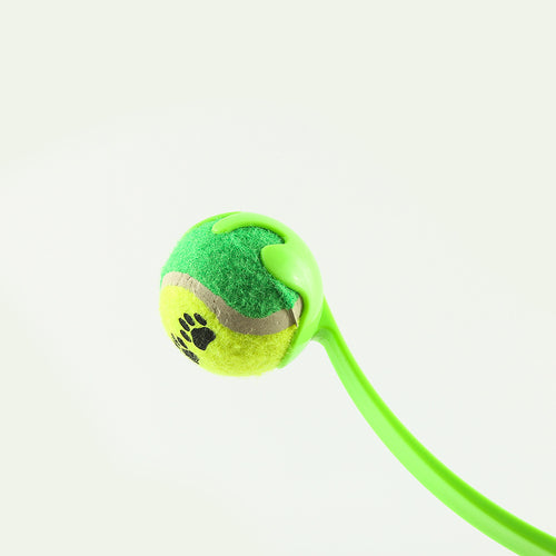 Green dog fetch launcher stick showing ergonomic handle design